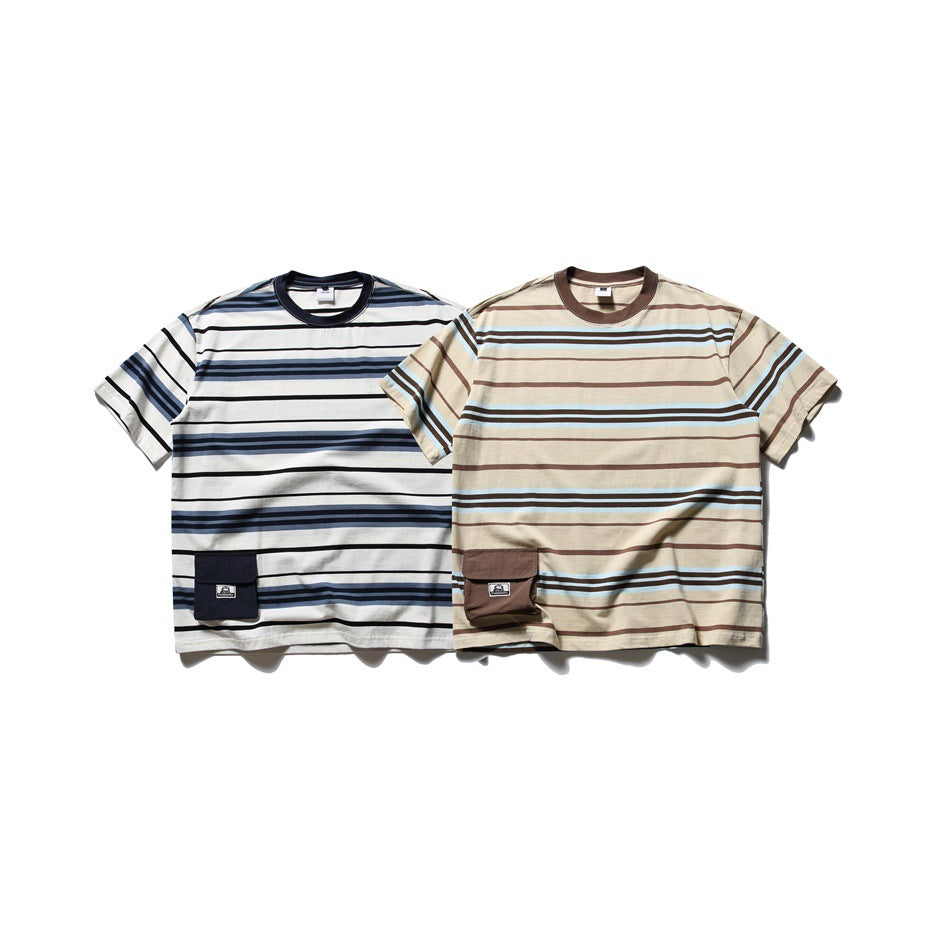 Two short-sleeve striped crew-neck T-shirts shown from the front: one white with navy stripes and one beige with brown and