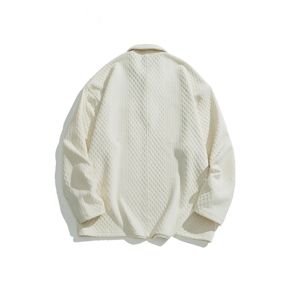 Back view of apricot cream textured long-sleeve polo pullover with diamond pattern and center vertical seam