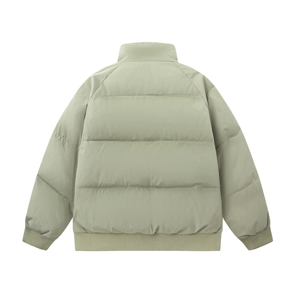 Back view of a light sage padded jacket with horizontal quilting, a high collar, and ribbed cuffs and hem.