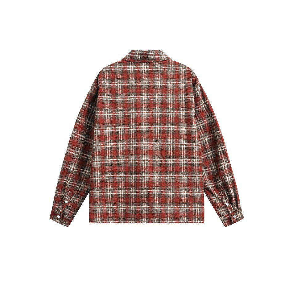Back view of a red-brown plaid button-up shirt laid flat, with long sleeves and button cuffs.