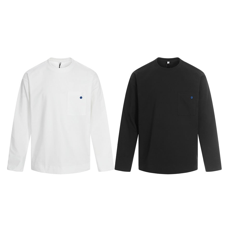 White and black long-sleeve crewneck shirts shown side by side, each with a chest pocket.