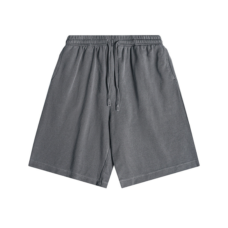 Gray washed-look knee-length drawstring shorts with elastic waistband and side pockets, flat lay front view