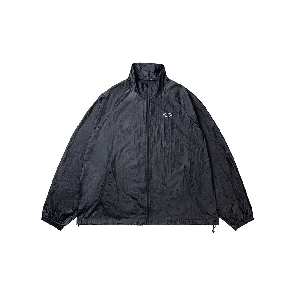 Black zip-front jacket with a stand collar, elastic cuffs, angled pockets, and a small chest emblem, shown flat.