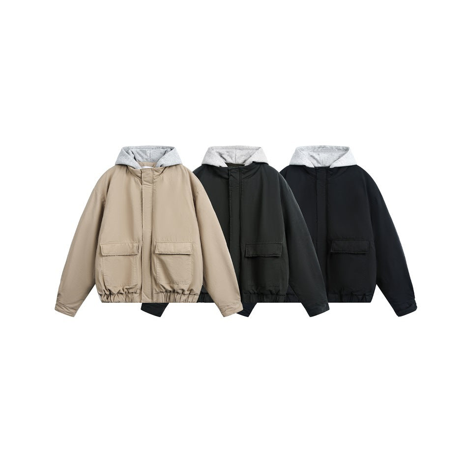 Three hooded jackets with flap pockets shown in beige, charcoal, and black colorways.
