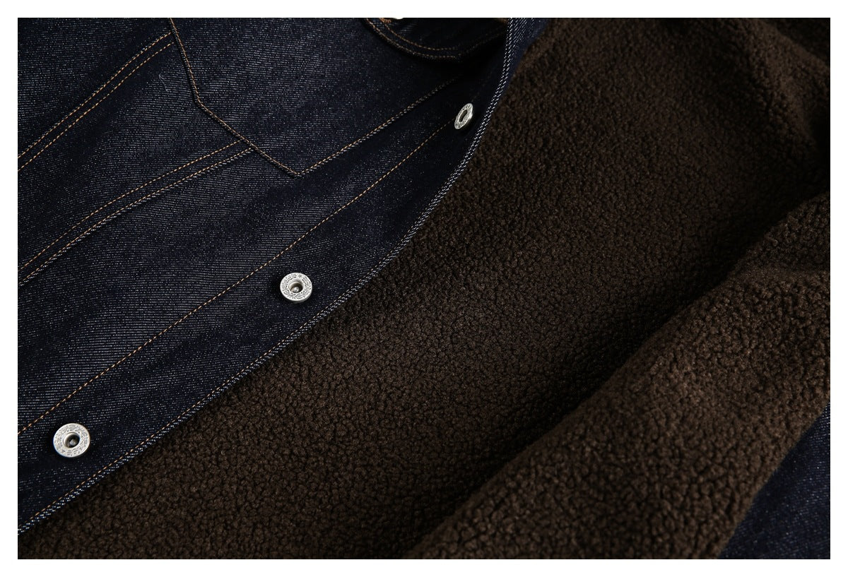 Close-up of the jacket's brown fleece lining beside dark denim stitching and silver snap fasteners.