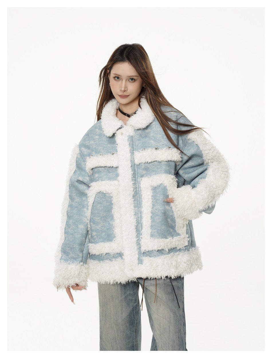 Model wearing a light blue jacket with white fleece-like trim and large pockets, worn over light wash jeans