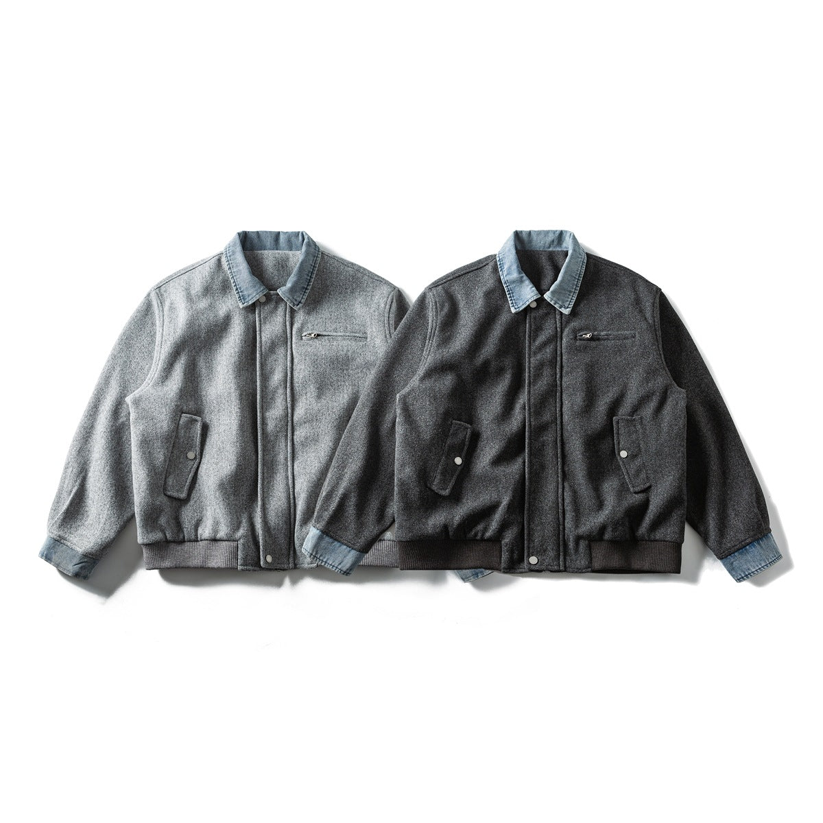 Two front views of collared jackets in light and charcoal gray, with denim collars and cuffs.
