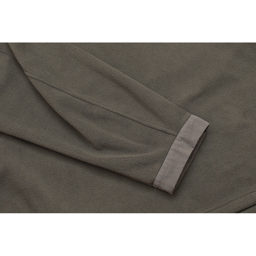 Close-up of an olive-gray fleece sleeve and its contrasting turned-back cuff.