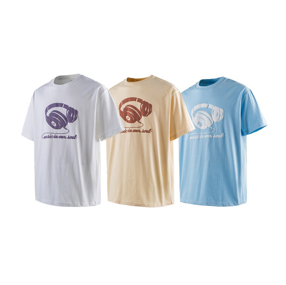 White, cream, and light blue short-sleeve T-shirts displayed front-facing with matching headphone graphics and slogan.