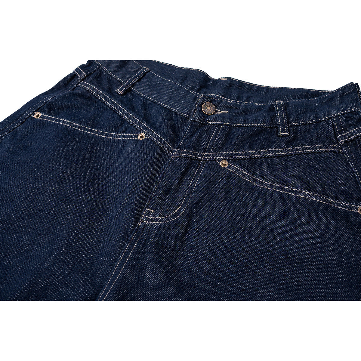 Close-up of dark indigo denim shorts showing the front waistband, button, rivets, and contrast stitching.