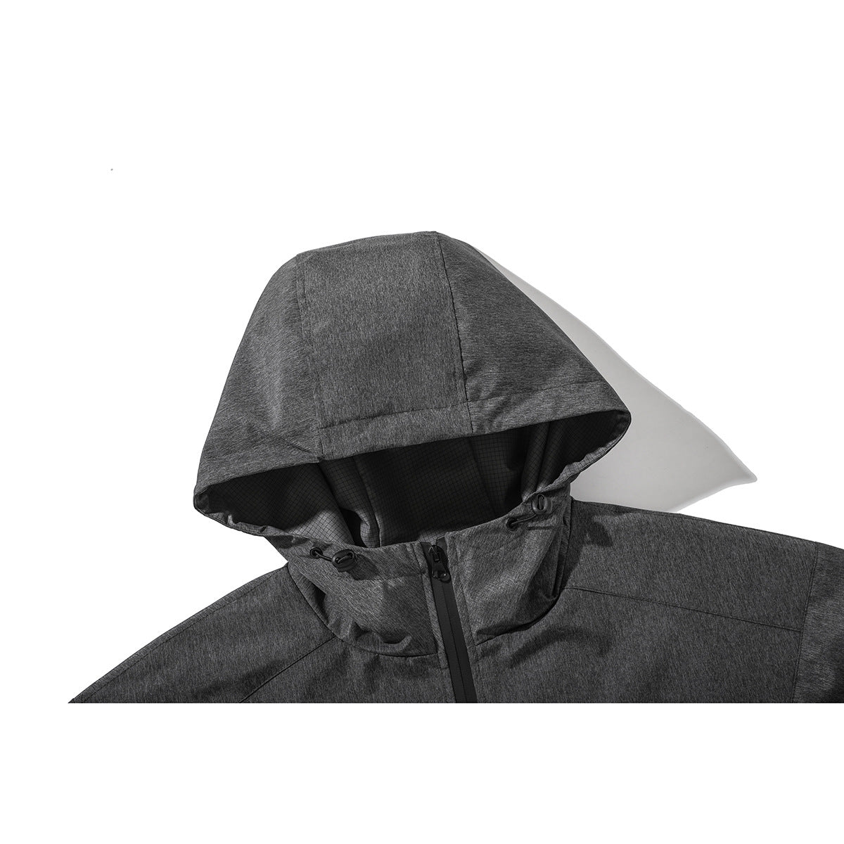 Close-up of a dark gray hooded jacket showing the hood lining, drawcords, and front zipper.