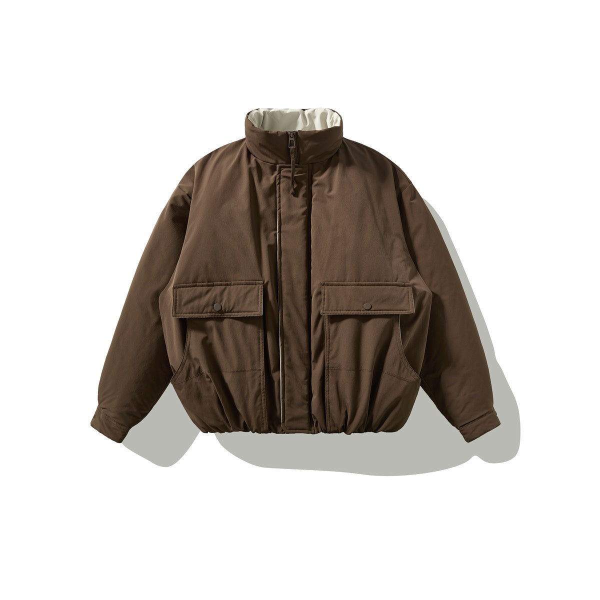 Front view of a brown high-collar jacket with a zipper, snap-flap pockets, and a gathered hem.