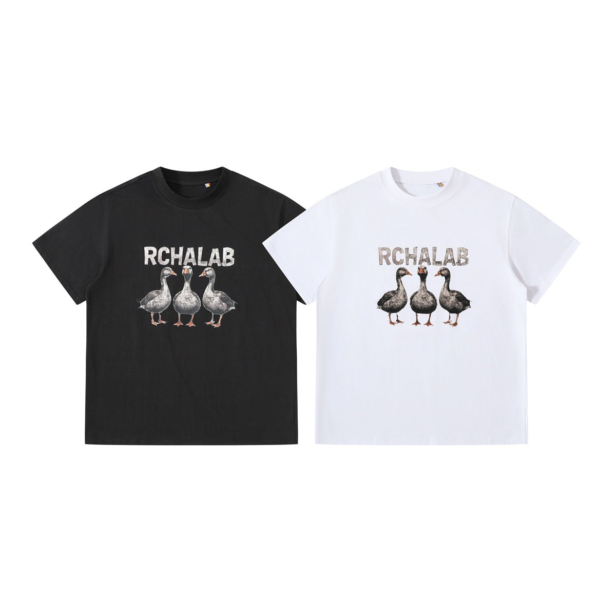 Front views of black and white crew-neck T-shirts, each printed with RCHALAB lettering and three geese.