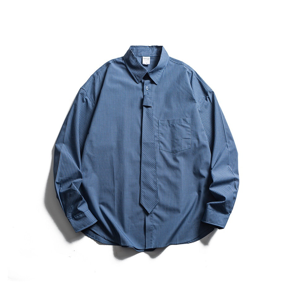 Blue small-plaid long-sleeve shirt flat lay with matching tie attached at collar and chest pocket