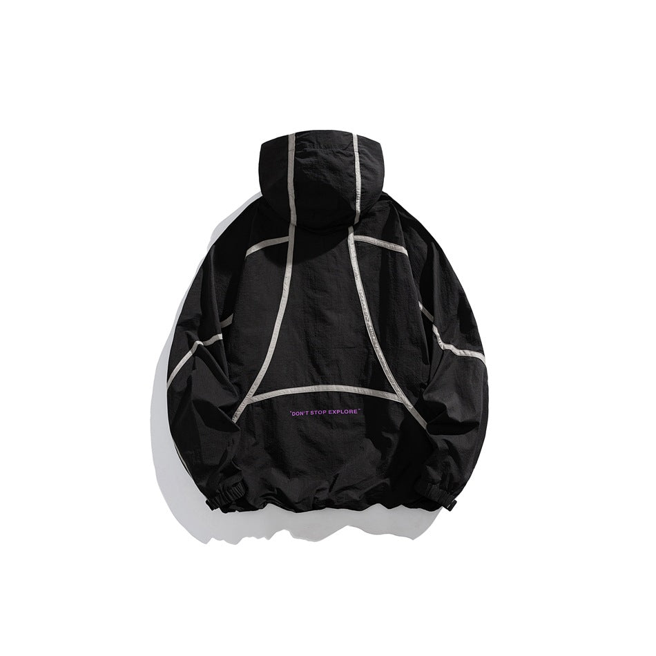 Back view of a black hooded jacket with pale piping, elastic cuffs and hem, and small text across the lower back.