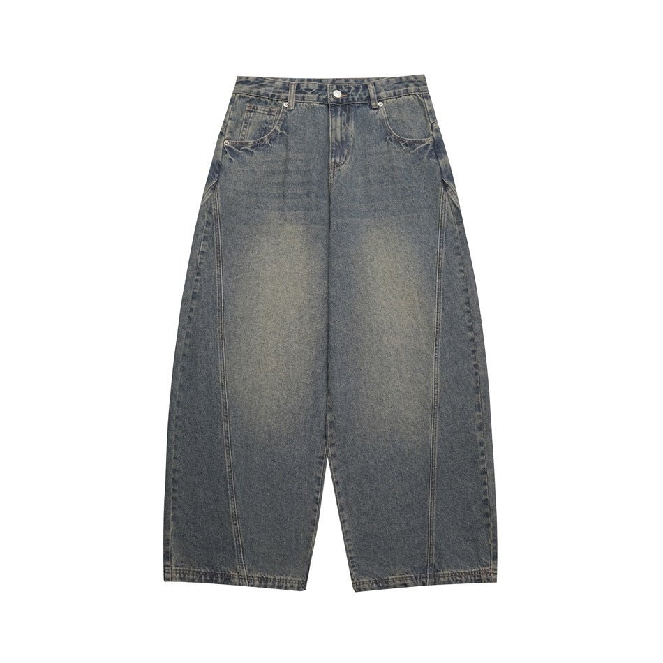 Vintage blue washed wide-leg barrel jeans, front flat lay with faded whiskers and curved leg seams