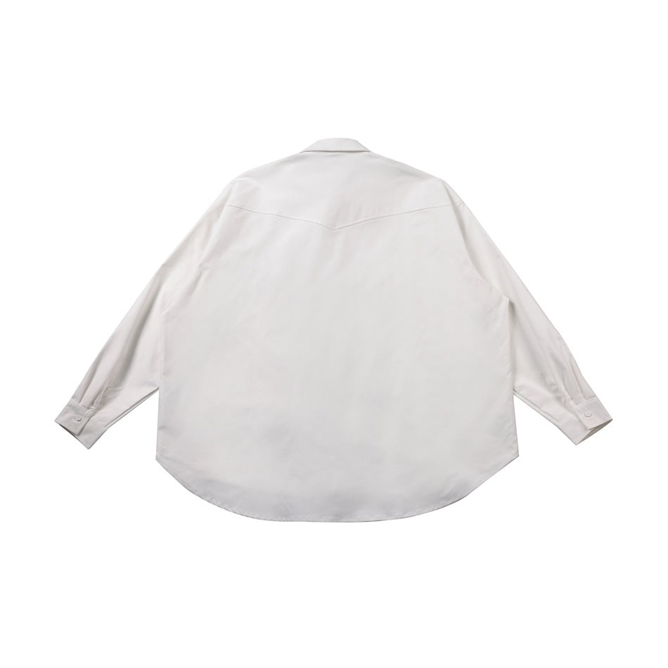 Back view of a white long-sleeve button-up shirt with a pointed yoke seam and curved hem.