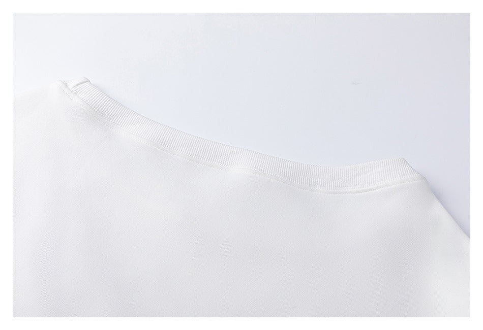 Close-up of the plain white sweatshirt back neckline and shoulder area.