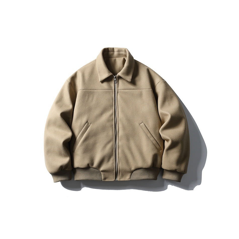 Full front view of a tan zip-up jacket with a pointed collar, slanted pockets, and ribbed cuffs and hem.