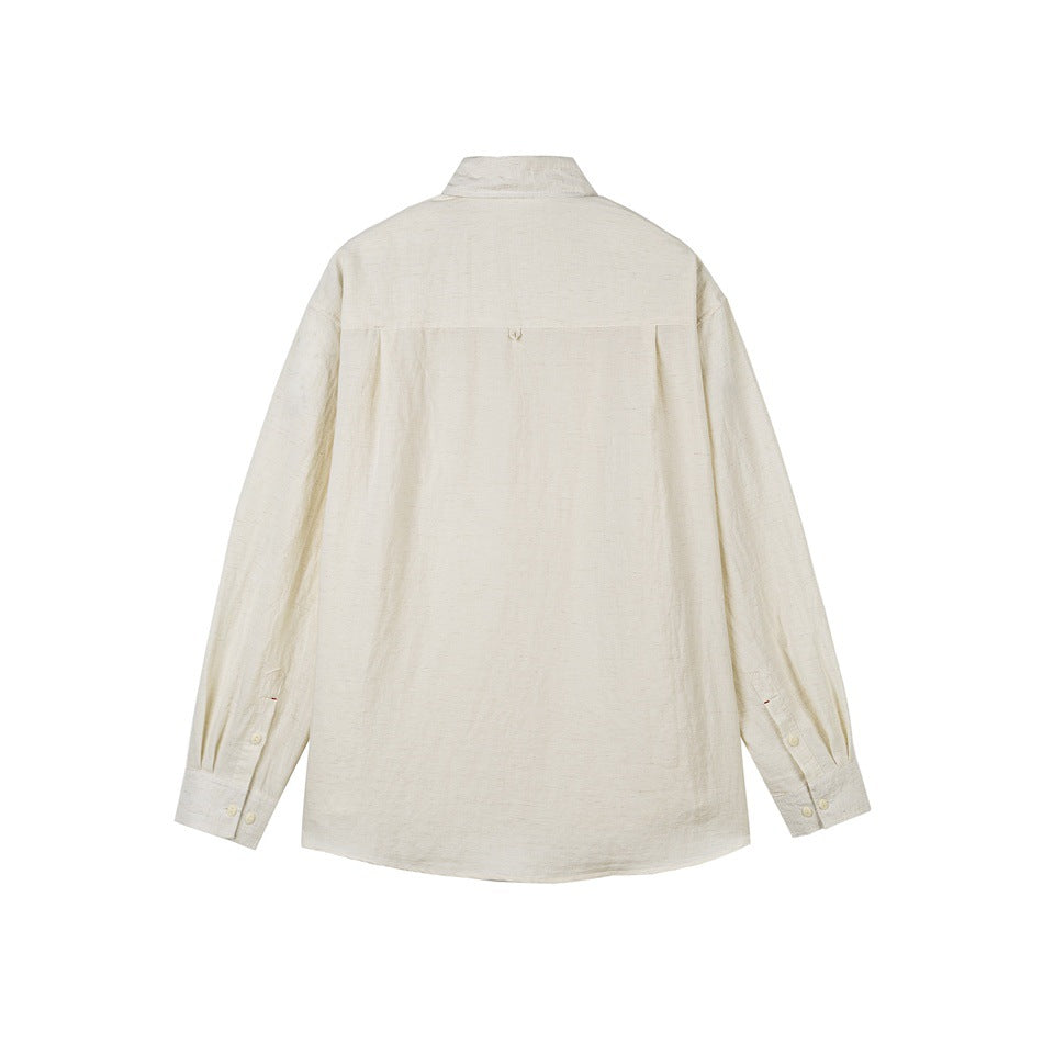 Back view of an off-white long-sleeve button-up shirt with a pointed collar and curved hem.
