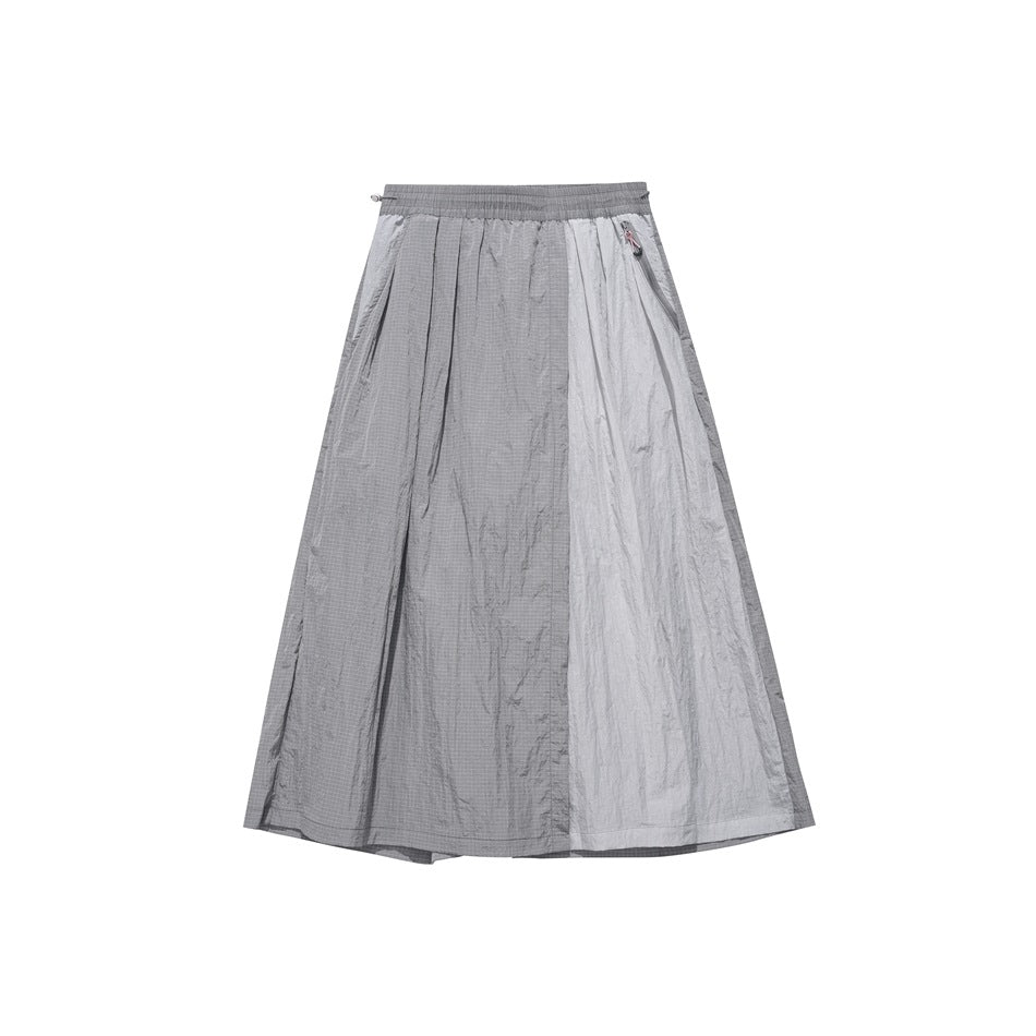 Gray two-tone color-block skirt-pants with elastic waist, pleats and side zip pocket, flat lay