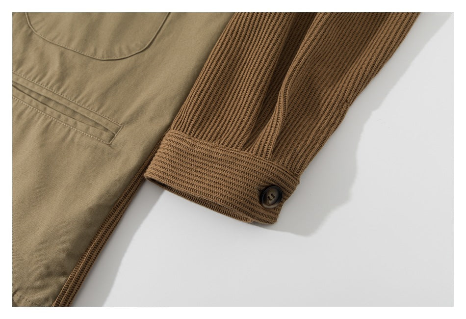 Close-up of a brown ribbed knit sleeve ending in a tan cuff with a dark button.