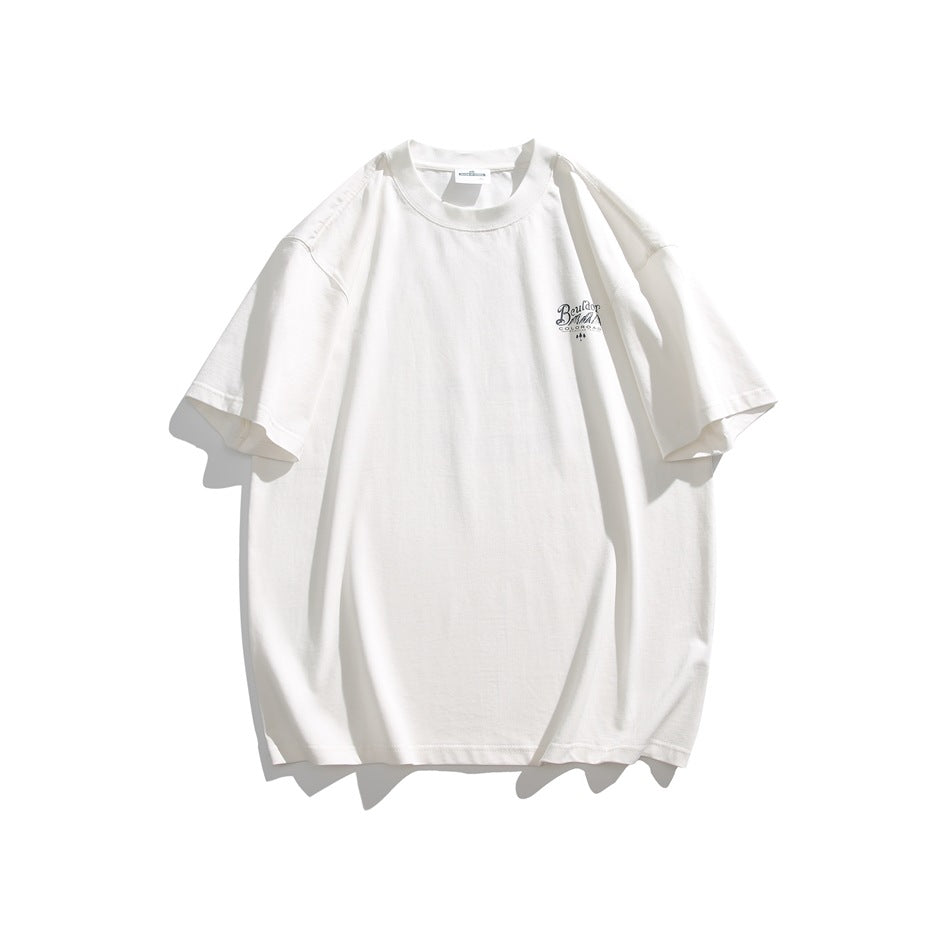 White oversized crewneck T-shirt displayed flat, with short sleeves and a small dark chest print.