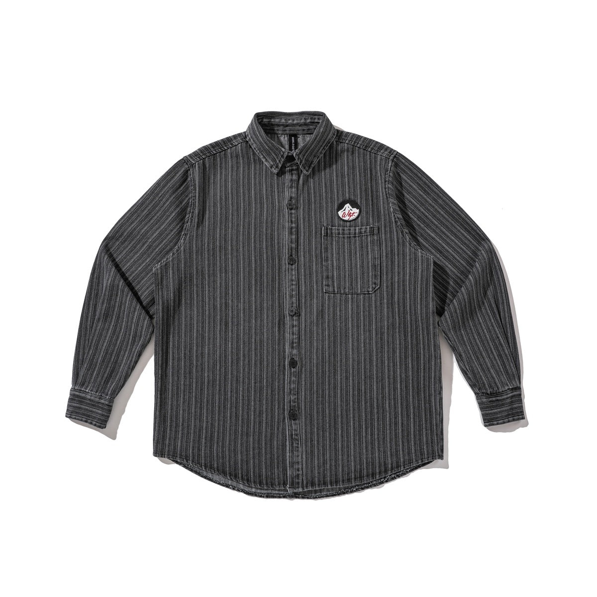 Washed black vertical-stripe long-sleeve button-up shirt with chest pocket and round mountain patch, flat lay front view