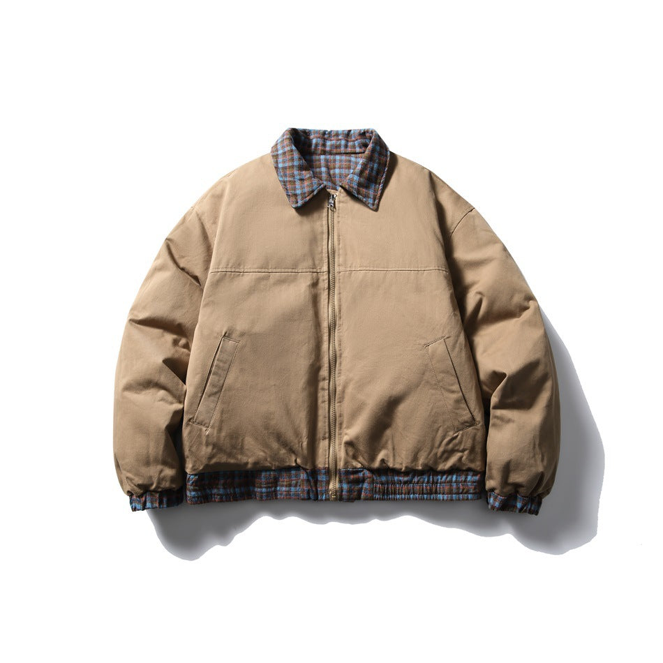 Khaki padded bomber-style jacket with plaid collar, hem and cuffs, front zipper and angled pockets, flat lay