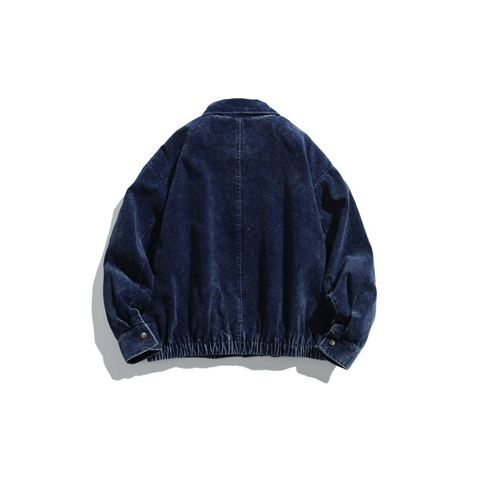 Dark navy jacket shown from the back, with an elasticized hem and snap-button sleeve cuffs.