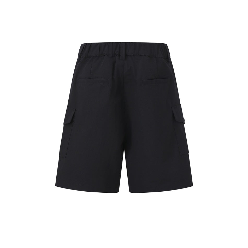 Rear view of black cargo shorts with an elastic waistband, belt loops, rear pockets, and flap side pockets.