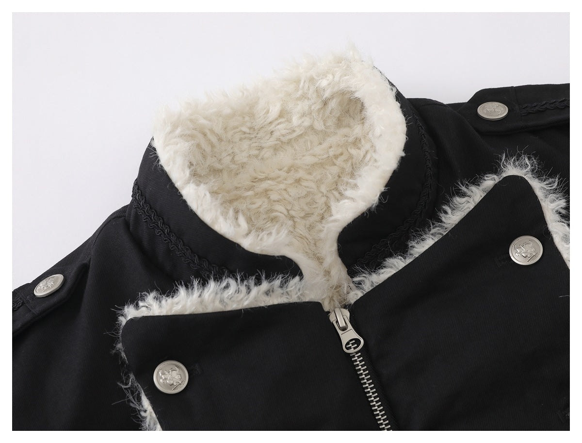Close-up of the black jacket's white fluffy collar lining, zipper, braided trim, and silver buttons.