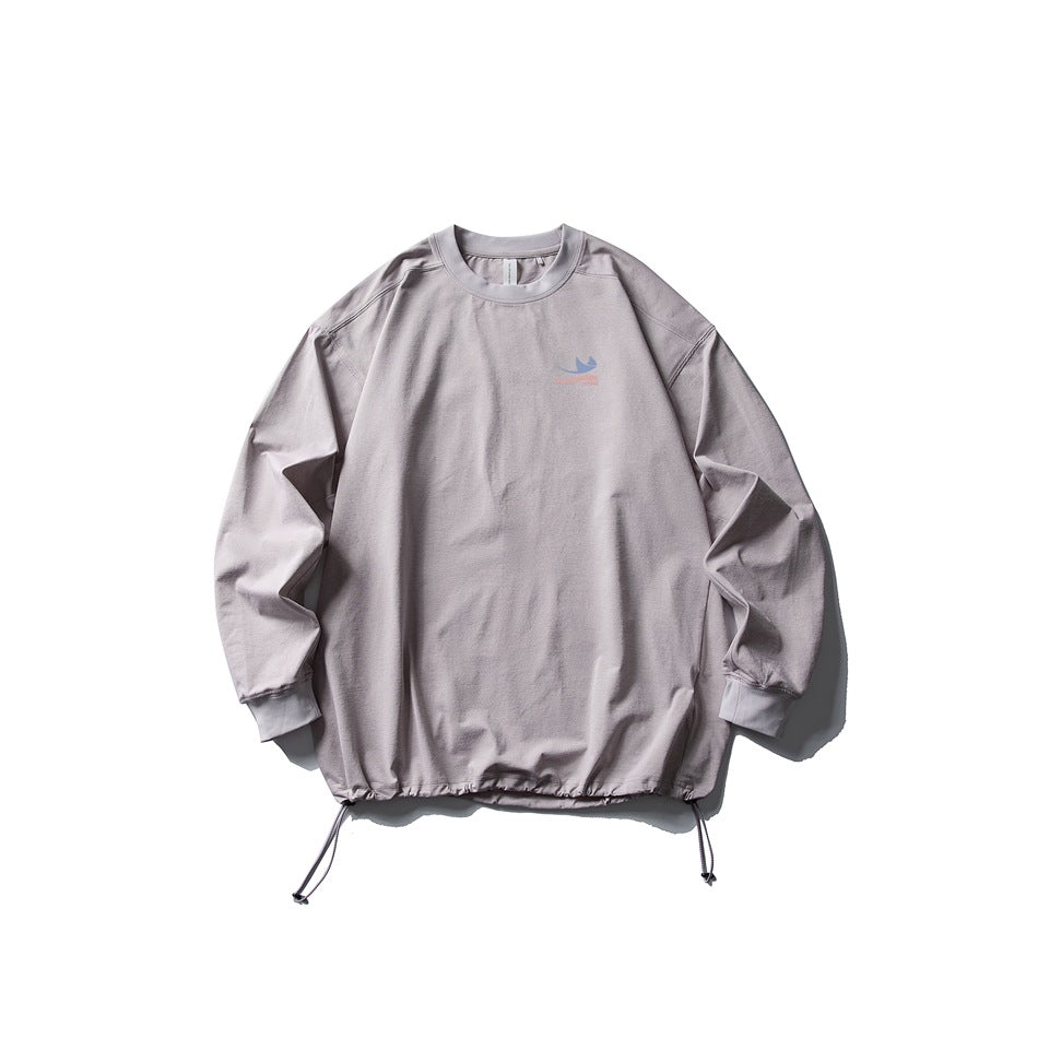 Muted mauve-gray long-sleeve crew-neck top flat lay with drawstring hem and chest print