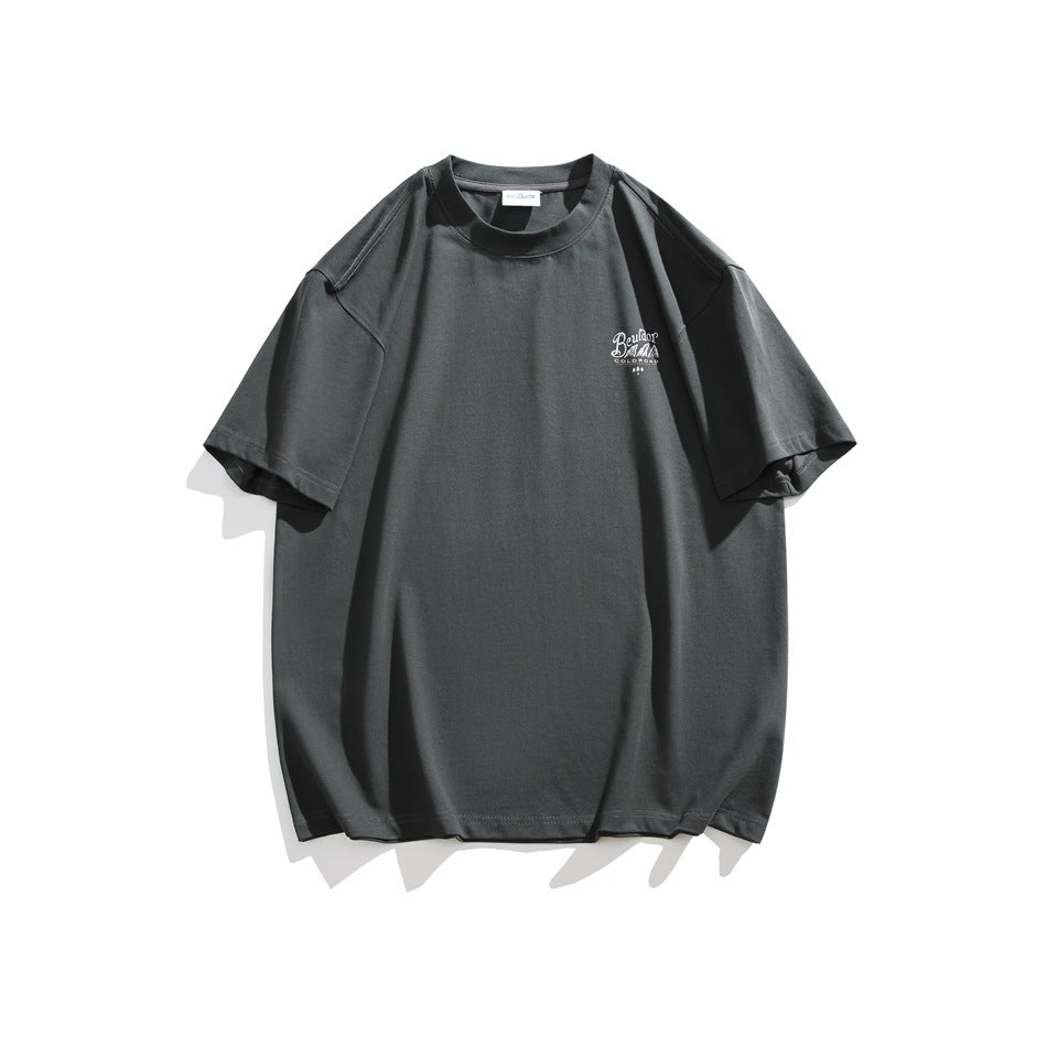 Charcoal gray oversized crewneck T-shirt displayed flat, with short sleeves and a small light chest print.