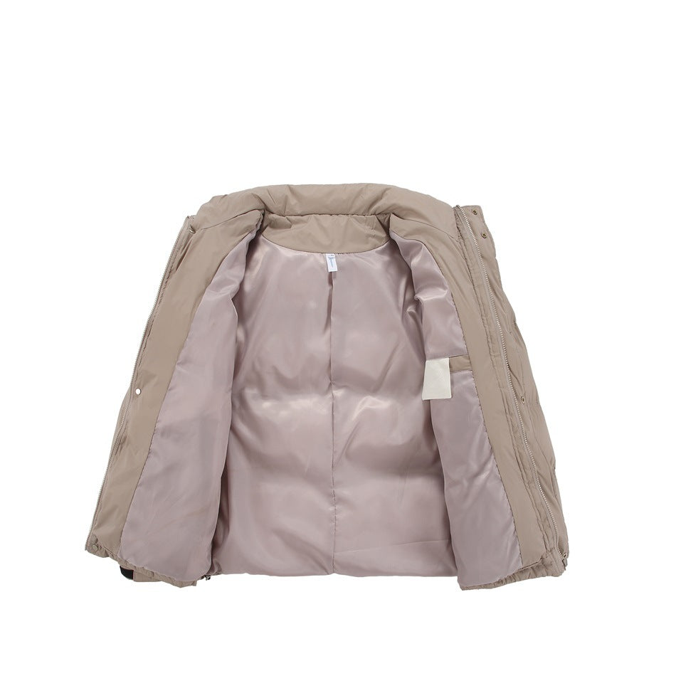 Open taupe jacket showing its pale mauve lining, front zipper edges and inner label.