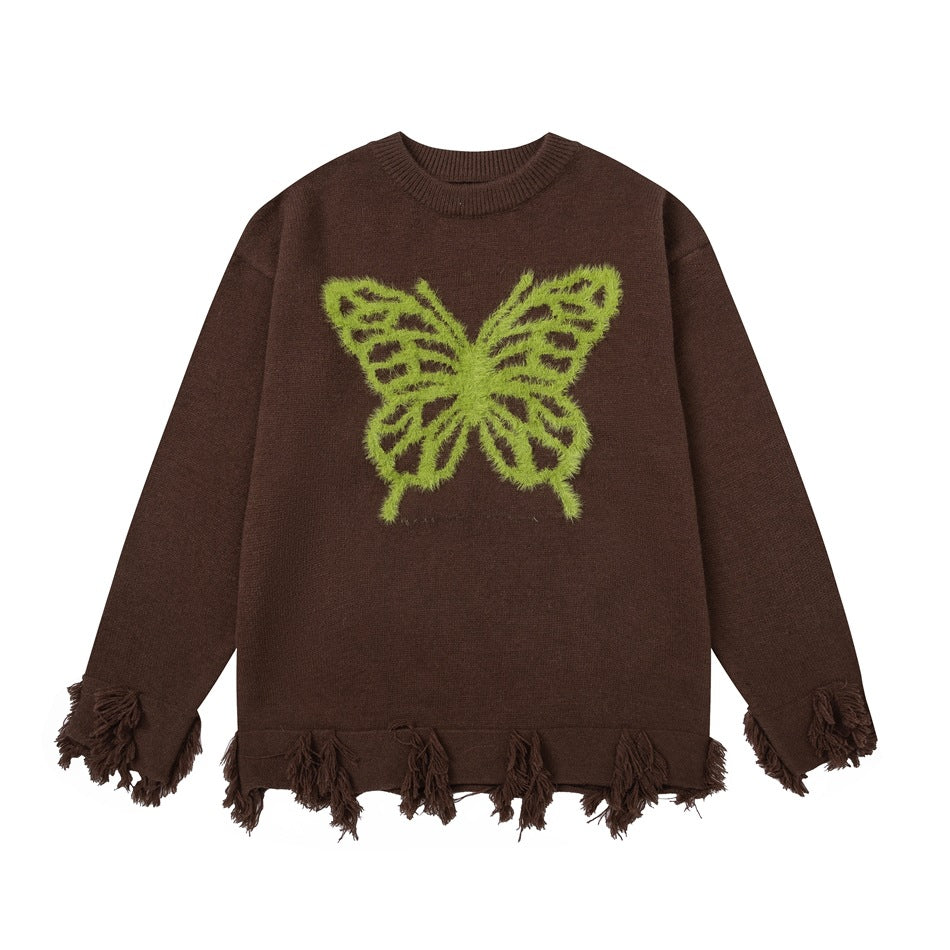 Brown knit sweater with green fuzzy butterfly motif and frayed fringe hem and cuffs, flat lay front view