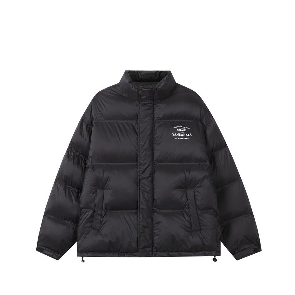 Black stand-collar quilted puffer jacket, front view, with zip placket, slanted pockets and chest print