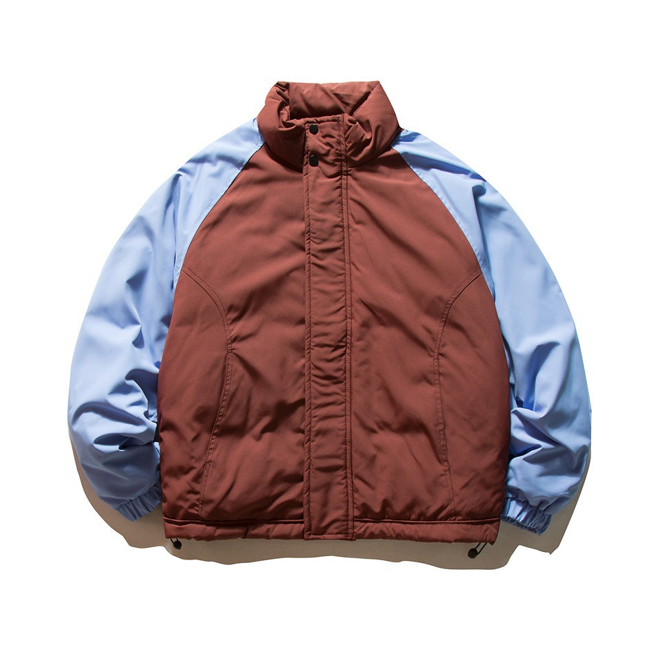 Burgundy puffer jacket with light blue raglan sleeves, stand collar and front zip placket, flat lay front view