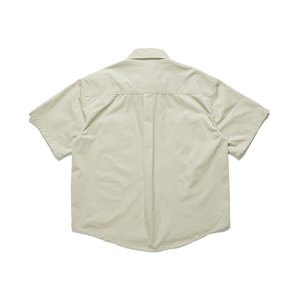 Beige short-sleeve shirt back view with yoke seam and center pleat, flat lay