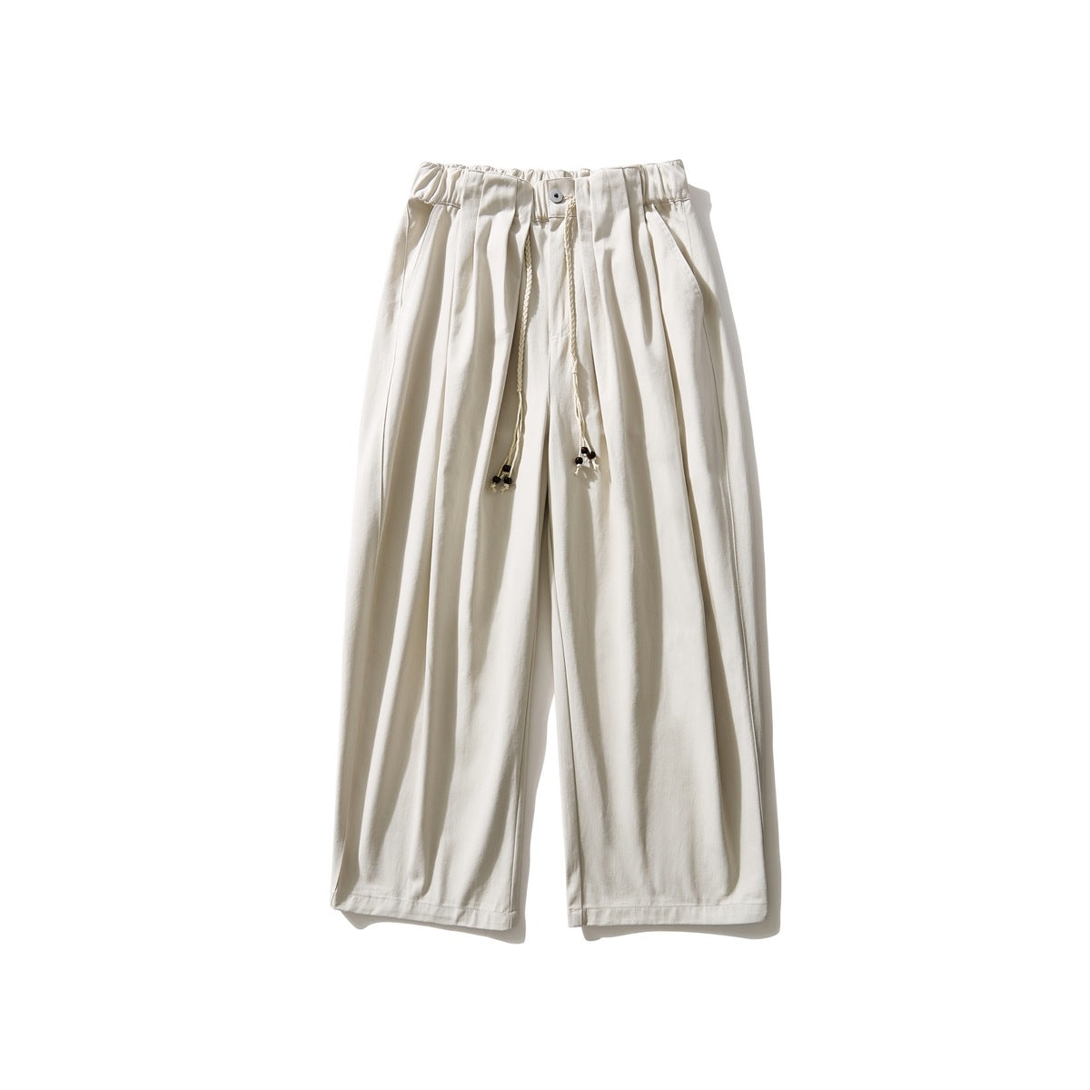 Beige wide-leg pleated pants with elastic waist, button and braided beaded drawcord, flat lay front view