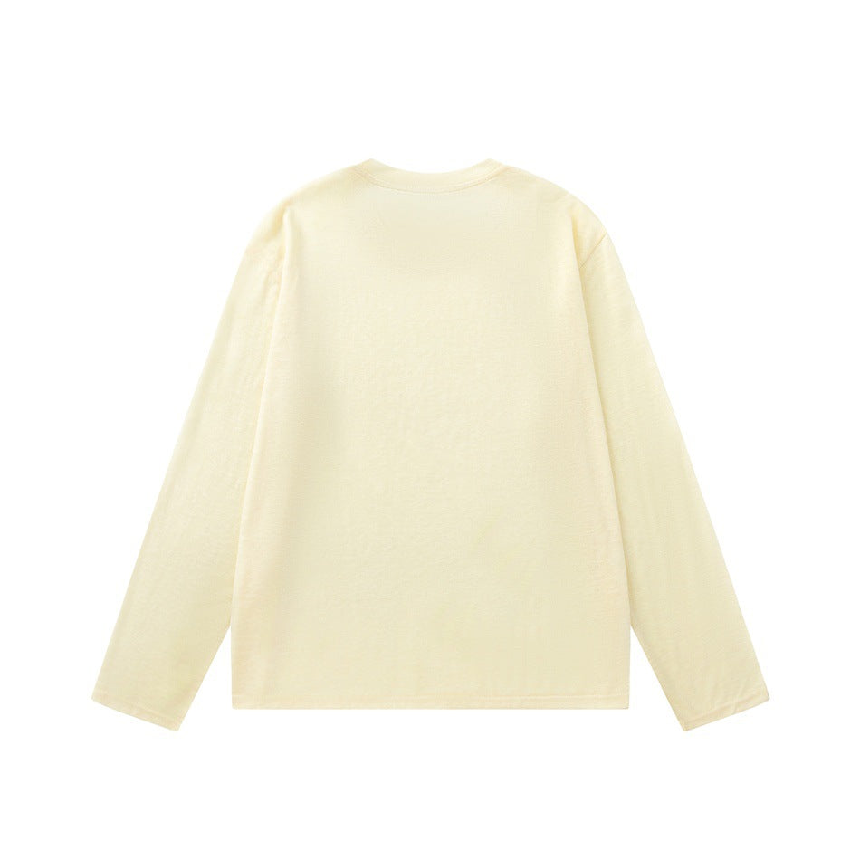 Back view of a plain pale cream long-sleeve crew-neck shirt laid flat on a white background.