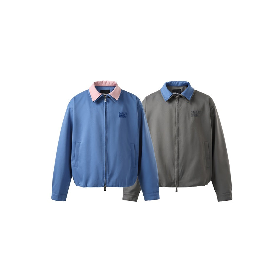 Two front views of zip jackets: blue with a pink collar and gray with a blue collar.