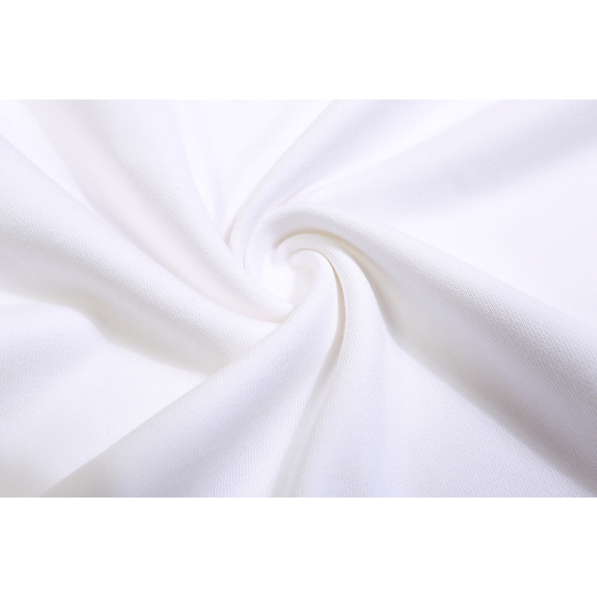 Close-up of white sweatshirt fabric gathered into a spiral, showing its surface texture.