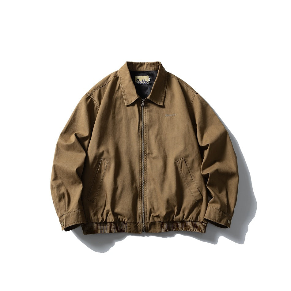 Brown collared zip-front jacket flat lay with slanted pockets, snap cuffs and ribbed hem
