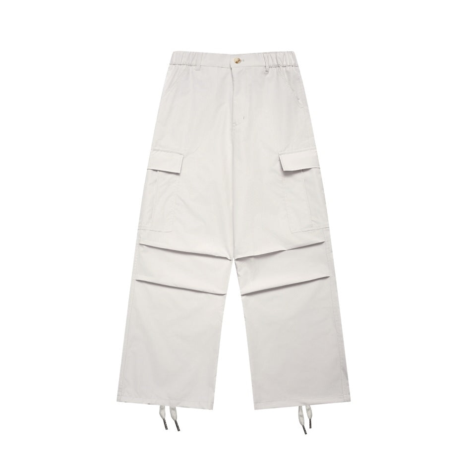 Off-white wide-leg cargo pants flat lay with flap pockets, knee pleats and drawstring hems