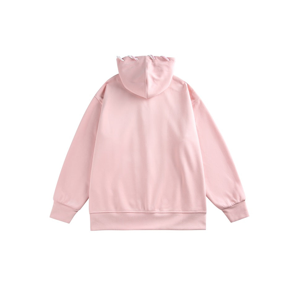 Back view of a pale pink hooded sweatshirt with cord loops along the hood.