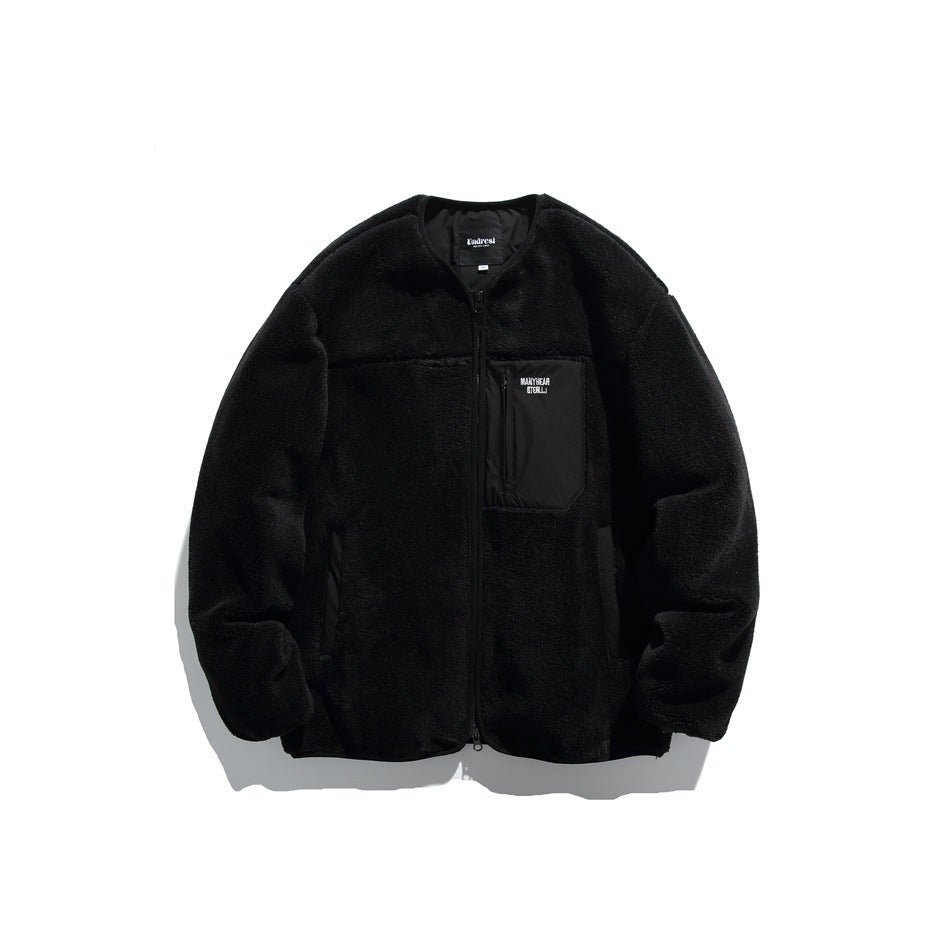Black fleece-like collarless zip jacket with tonal chest zip pocket and slanted side pockets, front view