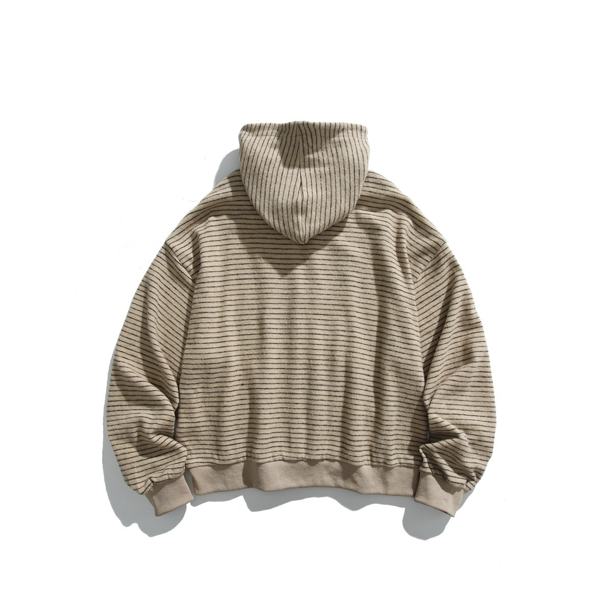 Back view of a beige hoodie with fine dark stripes and matching ribbed cuffs and hem.