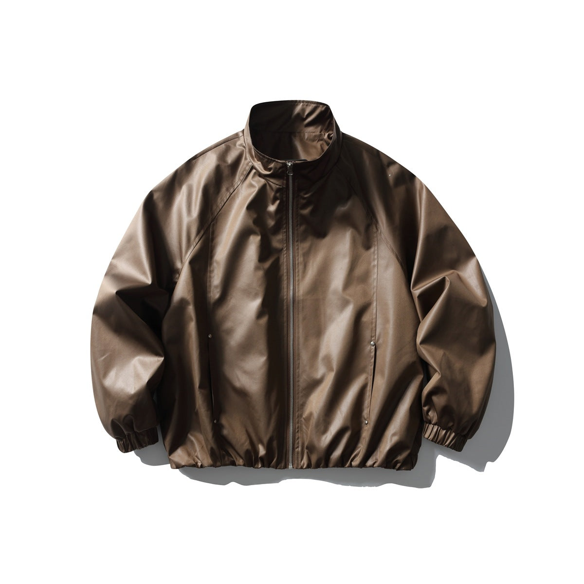 Brown glossy stand-collar zip jacket with raglan sleeves and elastic cuffs and hem, shown flat from the front