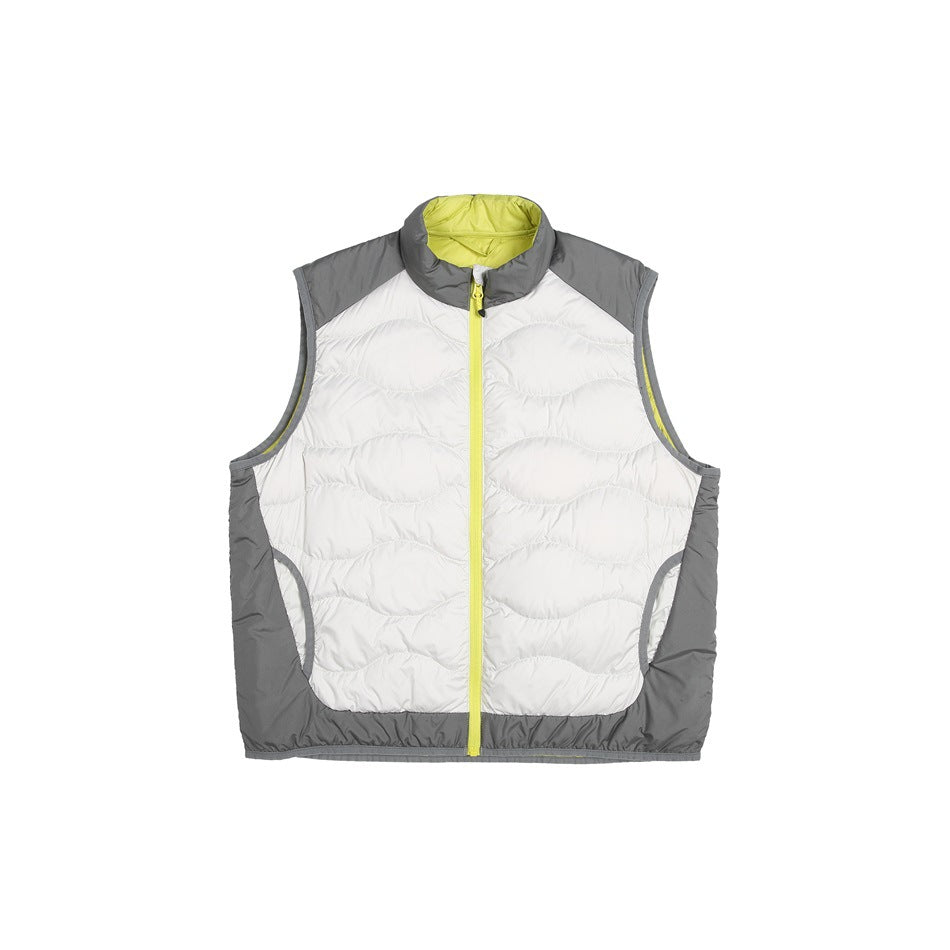 Front view of a white quilted sleeveless vest with gray panels and a bright yellow zipper and collar lining.